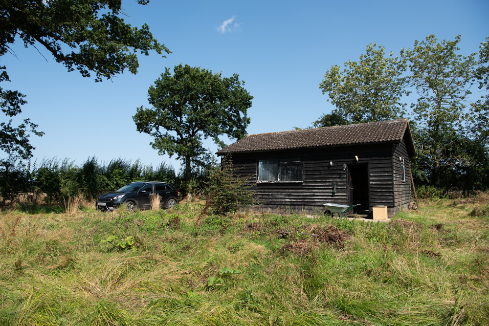 barn and car